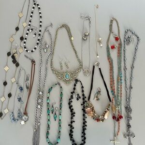 13 sets of costume jewelry. Matching necklace and earrings.